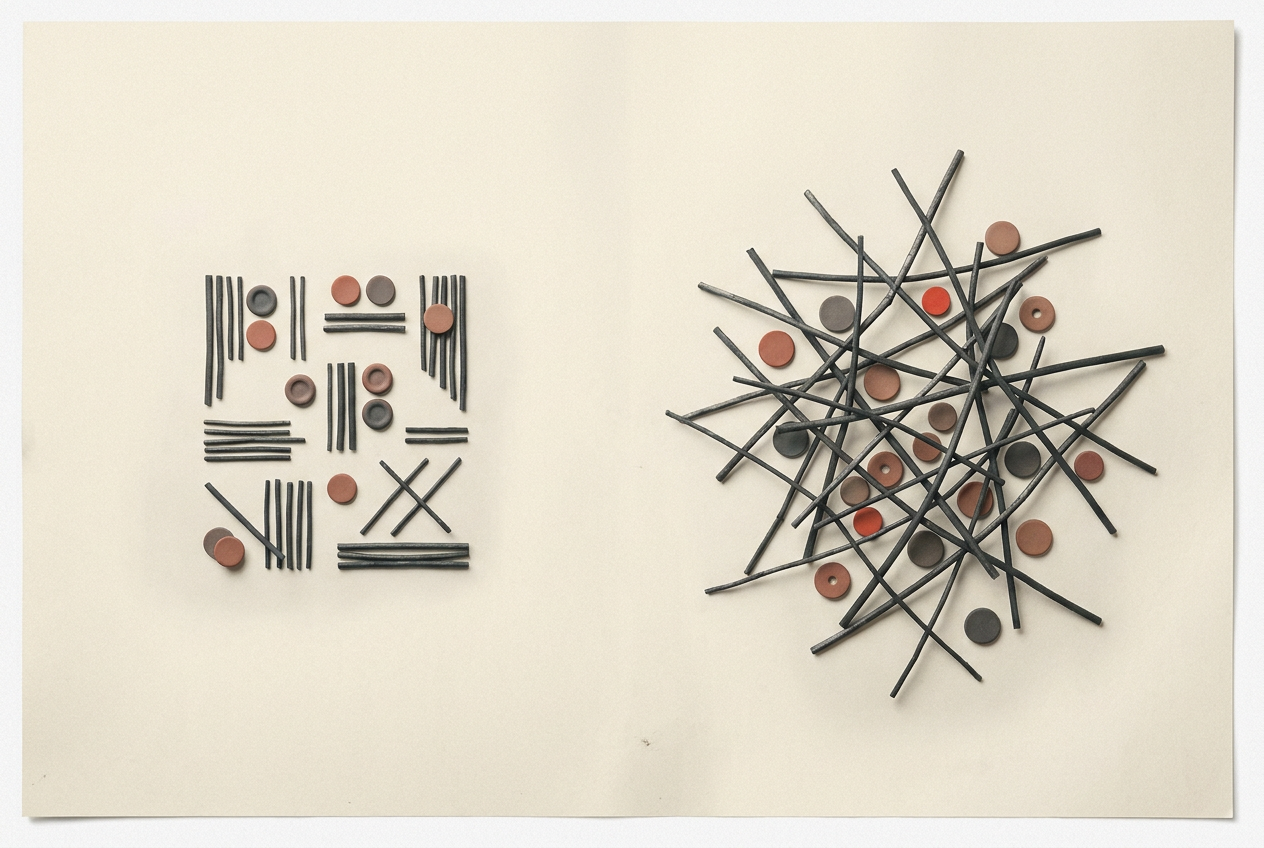 A shallow arrangement of rods and ceramic discs beside a dense, overlapping cluster.